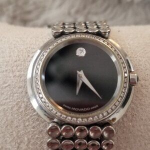 Ladies bracelet and diamond Movado watch